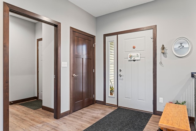 2006 13th Ave NE, Austin, MN 55912 - foyer with light wood-style flooring and baseboards