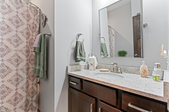 2006 13th Ave NE, Austin, MN 55912 - full bathroom featuring vanity and a shower with curtain