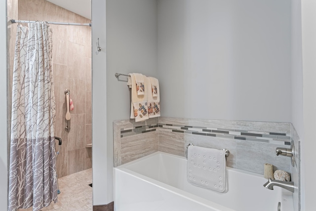 2006 13th Ave NE, Austin, MN 55912 - full bathroom with a bath and a tile shower