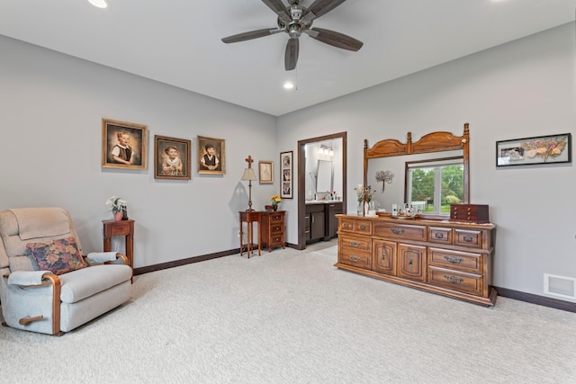 2006 13th Ave NE, Austin, MN 55912 - sitting room featuring light colored carpet, recessed lighting, a ceiling fan, and baseboards