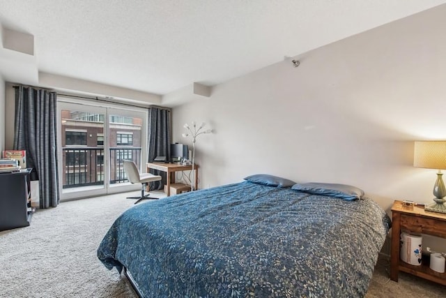 bedroom with carpet flooring and access to exterior
