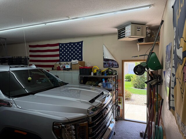 522 Delaware St SW, Lonsdale, MN 55046 - garage featuring washing machine and dryer and a heating unit