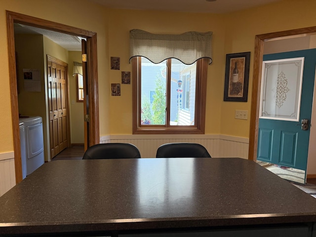 522 Delaware St SW, Lonsdale, MN 55046 - dining space featuring independent washer and dryer and wainscoting
