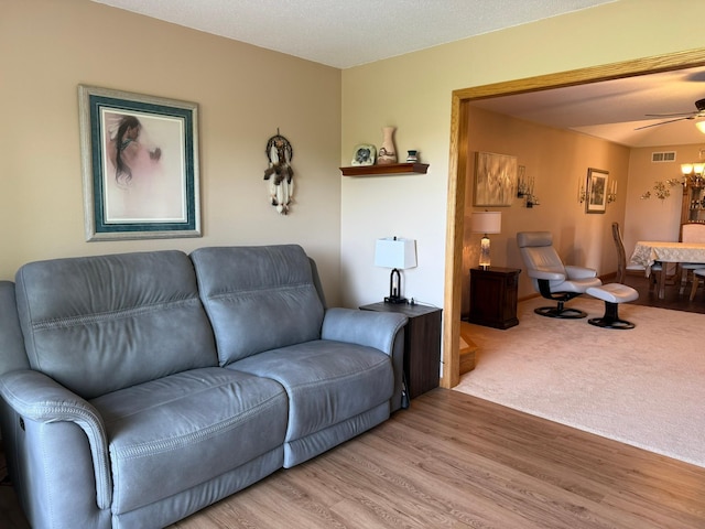 522 Delaware St SW, Lonsdale, MN 55046 - living area with light wood-style floors and a ceiling fan