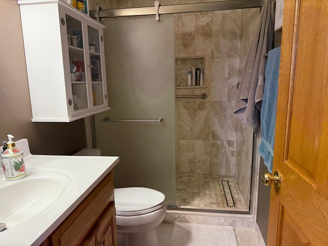 522 Delaware St SW, Lonsdale, MN 55046 - bathroom featuring a stall shower, toilet, and vanity