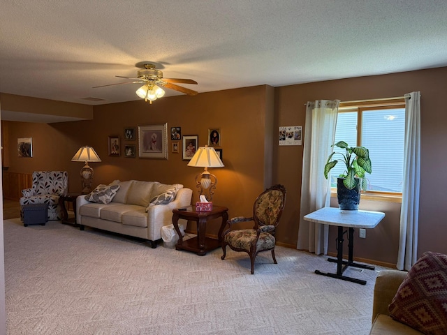 522 Delaware St SW, Lonsdale, MN 55046 - living room featuring light carpet, ceiling fan, and a textured ceiling