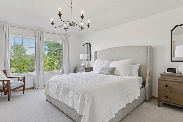 343 Primrose Path, Bayport, MN 55003 - bedroom featuring light carpet, a chandelier, and baseboards