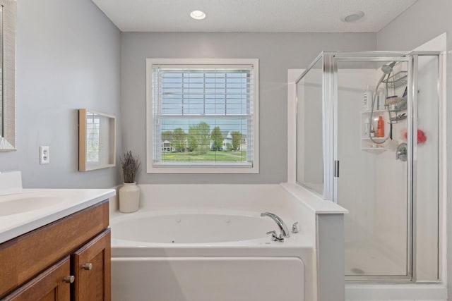 343 Primrose Path, Bayport, MN 55003 - full bath with vanity, a garden tub, and a shower stall