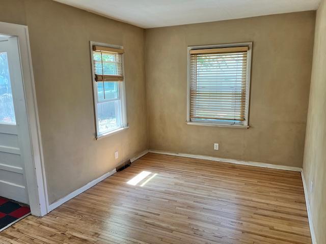 2748 41st Ave S, Minneapolis, MN 55406 - spare room featuring wood finished floors and baseboards