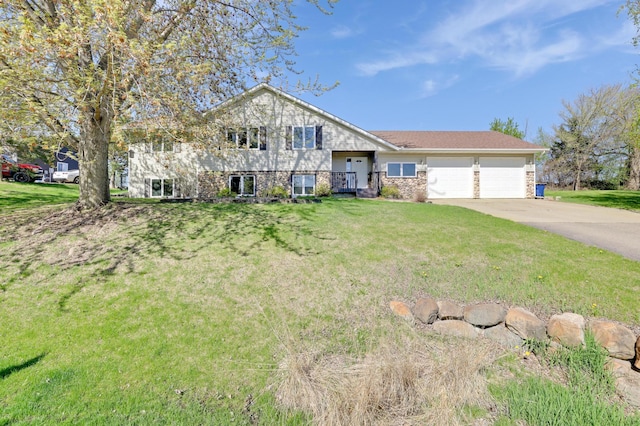 4954 Jeffers Ct, Lonsdale, MN 55046 - split level home featuring an attached garage, driveway, and a front yard