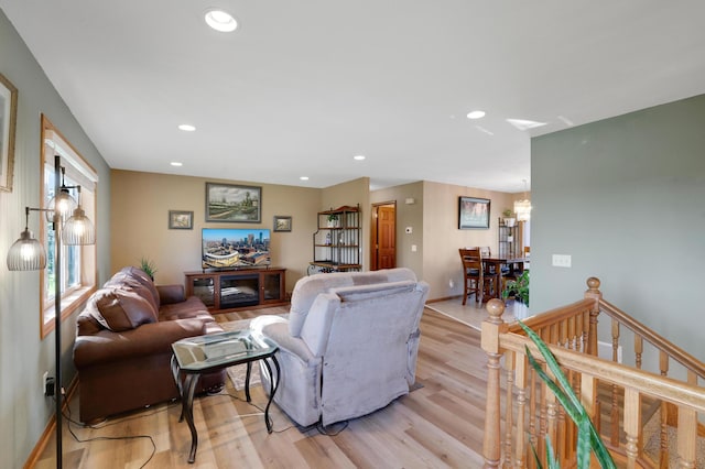 4954 Jeffers Ct, Lonsdale, MN 55046 - living area with light wood-type flooring, recessed lighting, a chandelier, and baseboards