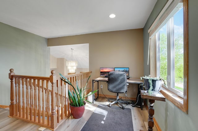 4954 Jeffers Ct, Lonsdale, MN 55046 - office area featuring healthy amount of natural light, a chandelier, wood finished floors, baseboards, and recessed lighting