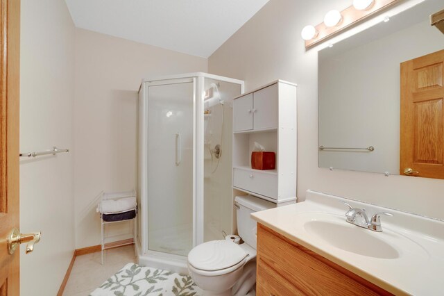 4954 Jeffers Ct, Lonsdale, MN 55046 - full bathroom with a shower stall, vanity, toilet, and tile patterned floors