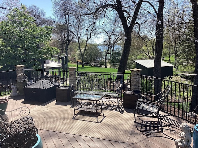 deck featuring a fire pit