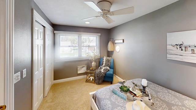 bedroom featuring carpet flooring, baseboards, and ceiling fan