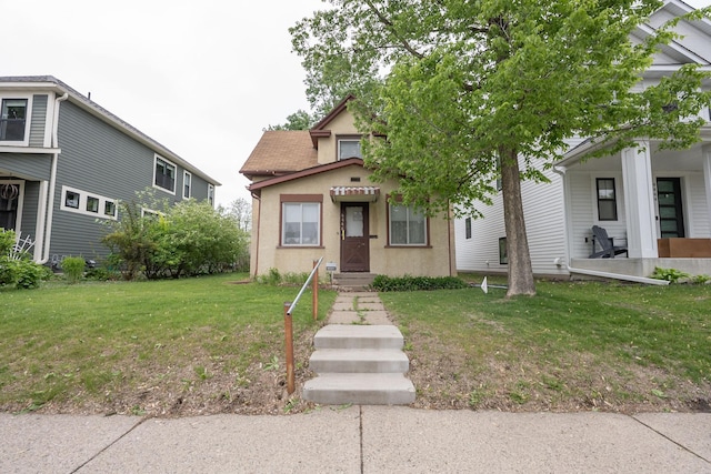 4448 43rd Ave S, Minneapolis, MN 55406 - view of front of home with a front yard and stucco siding