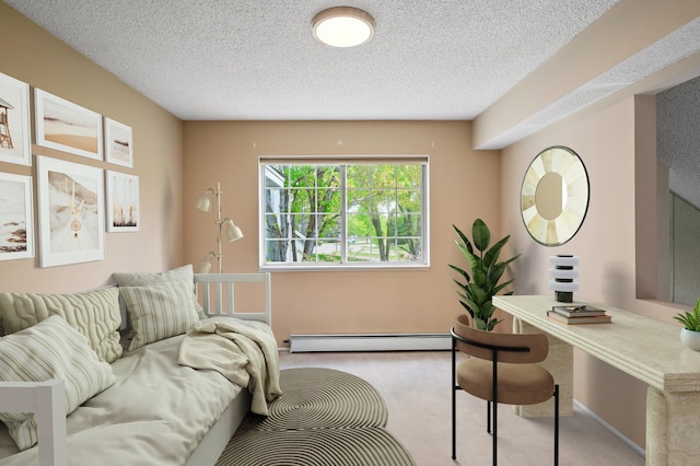 living area with carpet floors, a baseboard heating unit, and a textured ceiling
