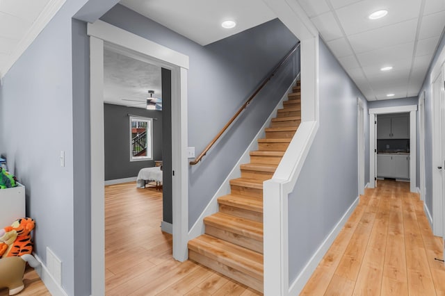 19776 214th Ave NW, Big Lake Twp, MN 55309 - staircase featuring wood-type flooring, baseboards, a ceiling fan, and recessed lighting