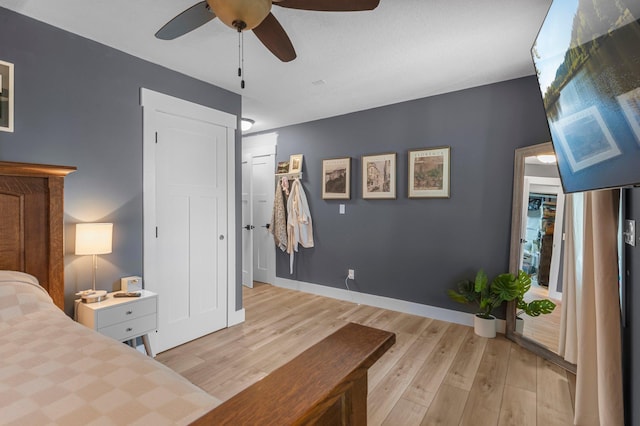 19776 214th Ave NW, Big Lake Twp, MN 55309 - bedroom featuring light wood-type flooring and ceiling fan