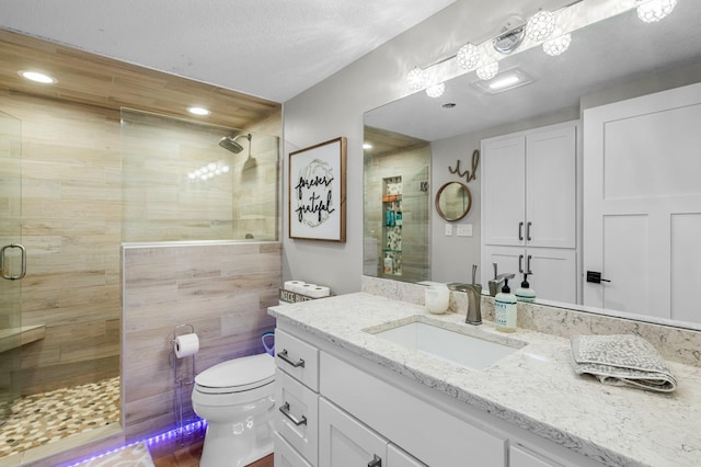 19776 214th Ave NW, Big Lake Twp, MN 55309 - bathroom featuring vanity, a shower stall, and recessed lighting