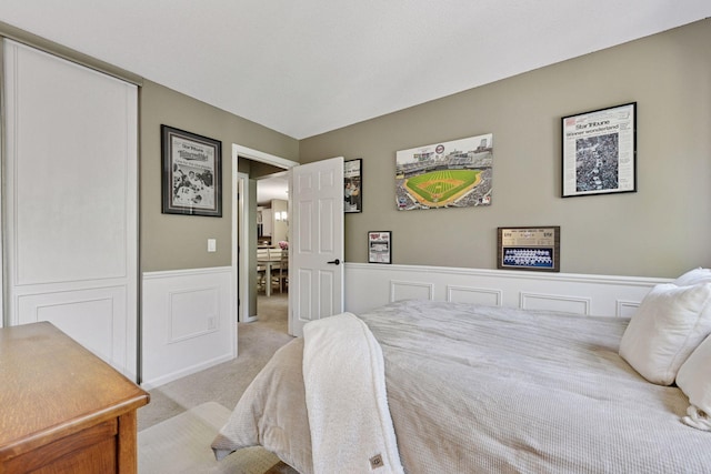 7618 York Ave S Unit 1318, Edina, MN 55435 - bedroom featuring carpet and a wainscoted wall