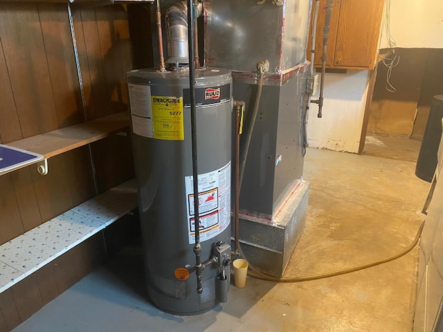 utilities featuring water heater and heating unit