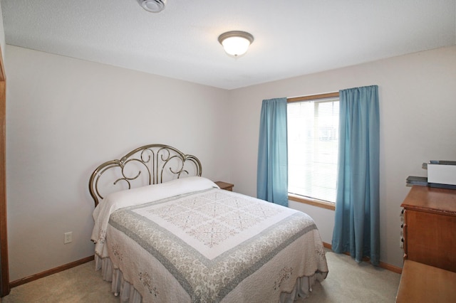 4129 6th St S, Saint Cloud, MN 56301 - bedroom featuring light colored carpet and baseboards