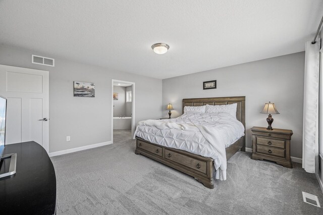 104 Hummingbird Way, Delano, MN 55328 - bedroom featuring baseboards, carpet floors, and ensuite bathroom