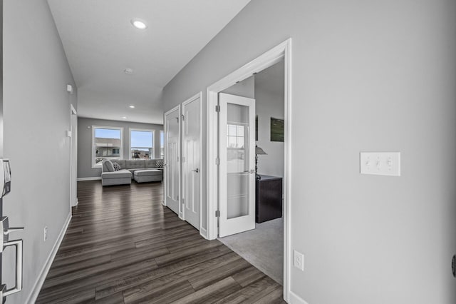 104 Hummingbird Way, Delano, MN 55328 - hall with dark wood-type flooring and recessed lighting