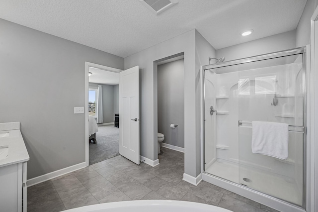 104 Hummingbird Way, Delano, MN 55328 - full bath with a shower stall, vanity, a textured ceiling, and ensuite bath