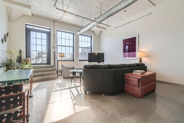 730 Stinson Blvd Unit 205, Minneapolis, MN 55413 - living area with plenty of natural light and concrete flooring