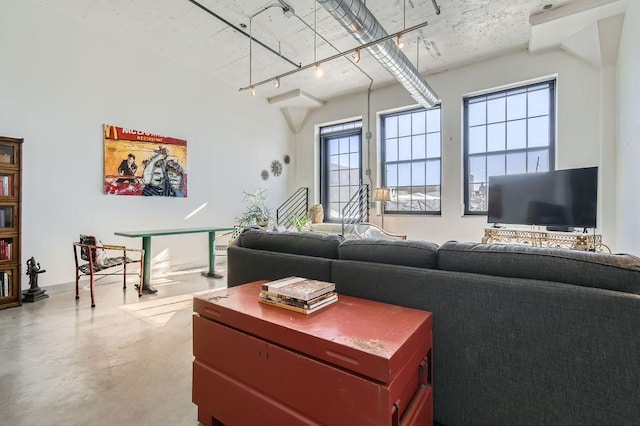 730 Stinson Blvd Unit 205, Minneapolis, MN 55413 - living area featuring healthy amount of natural light and concrete floors