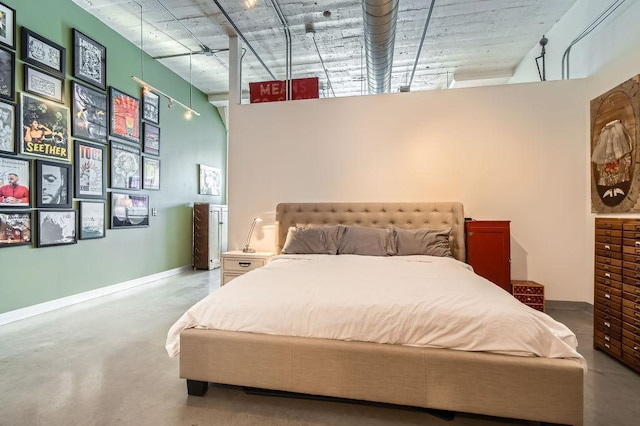 730 Stinson Blvd Unit 205, Minneapolis, MN 55413 - bedroom with finished concrete flooring and baseboards