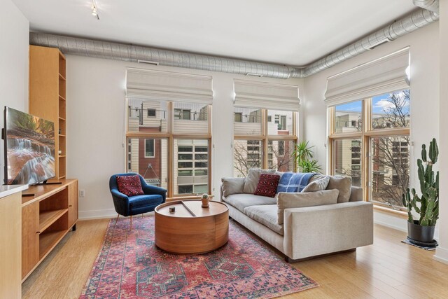 2845 Colfax Ave S Unit W202, Minneapolis, MN 55408 - sitting room with light wood finished floors and baseboards