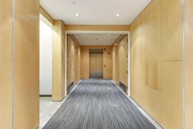 2845 Colfax Ave S Unit W202, Minneapolis, MN 55408 - hall with elevator and recessed lighting