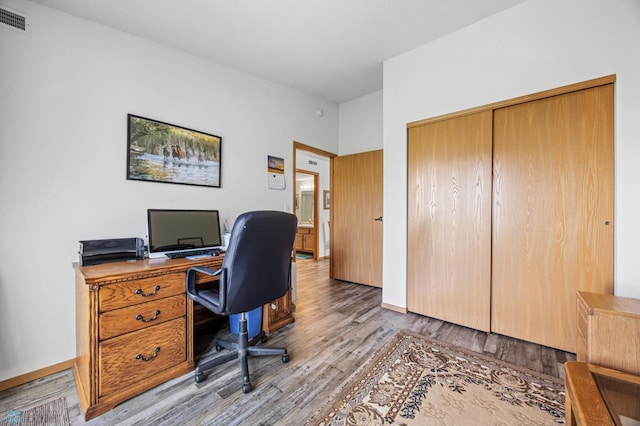 office area with wood finished floors