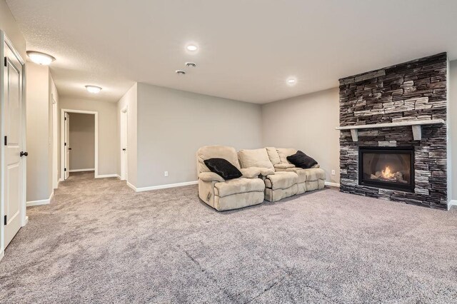 6168 Quenroe Ave NE, Otsego, MN 55330 - living room featuring carpet flooring and a stone fireplace