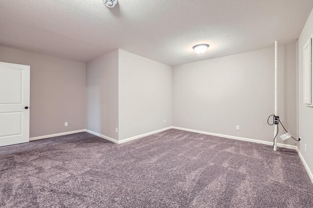 6168 Quenroe Ave NE, Otsego, MN 55330 - spare room with carpet and a textured ceiling