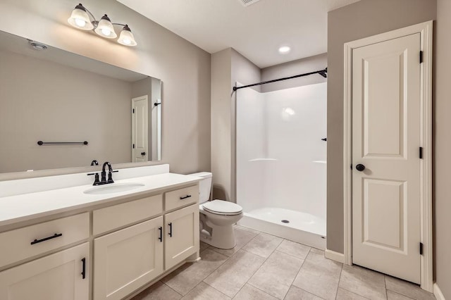 6168 Quenroe Ave NE, Otsego, MN 55330 - bathroom with vanity, a walk in shower, and tile patterned floors