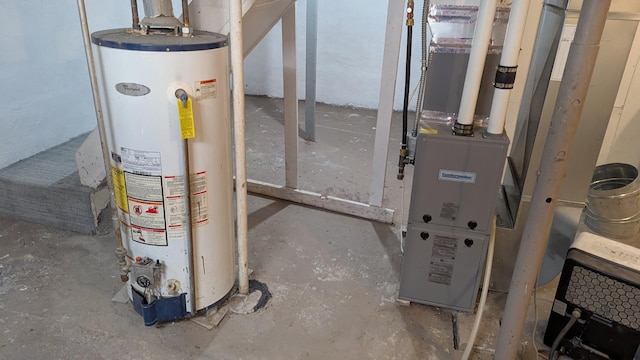 1211 10th Ave SW, Austin, MN 55912 - utility room featuring gas water heater