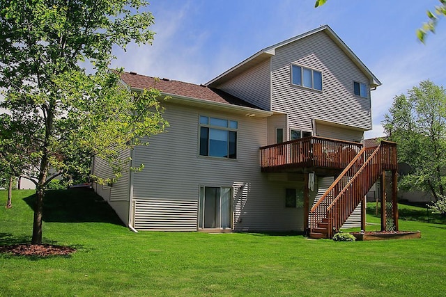 2607 226th Ln NW, Oak Grove, MN 55005 - back of property with a deck, a yard, and stairs