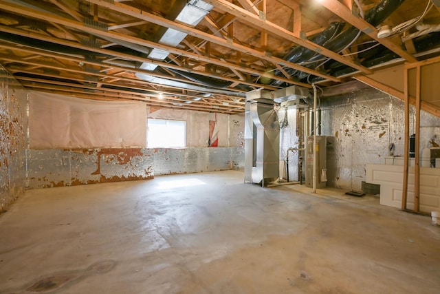 below grade area with gas water heater and heating unit