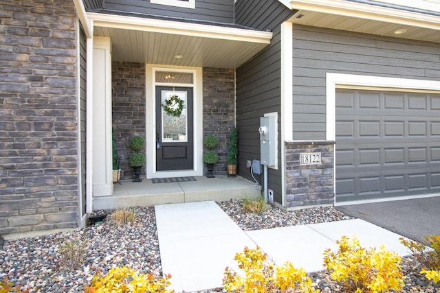 18122 Garland Path, Lakeville, MN 55044 - view of exterior entry with stone siding and a porch