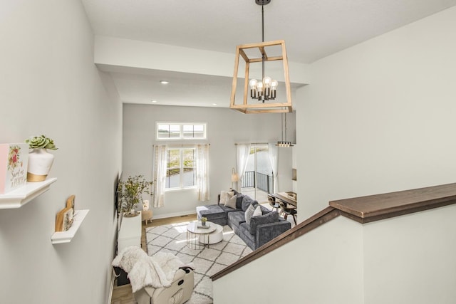 18122 Garland Path, Lakeville, MN 55044 - living room featuring wood finished floors, a chandelier, baseboards, and recessed lighting
