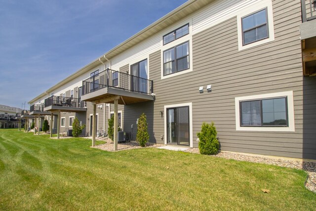 18122 Garland Path, Lakeville, MN 55044 - rear view of house featuring a yard and central AC unit