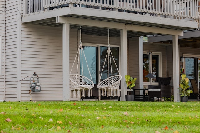 2520 Le Homme Dieu Hts NE Unit 2, Alexandria Twp, MN 56308 - entrance to property with a lawn and a balcony