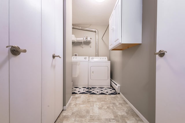 2520 Le Homme Dieu Hts NE Unit 2, Alexandria Twp, MN 56308 - laundry room with separate washer and dryer, baseboard heating, cabinet space, and baseboards