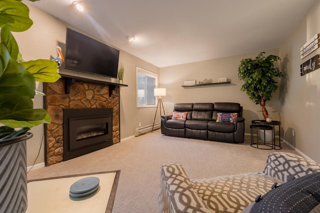 2520 Le Homme Dieu Hts NE Unit 2, Alexandria Twp, MN 56308 - living area featuring a baseboard radiator, carpet, baseboards, and a stone fireplace