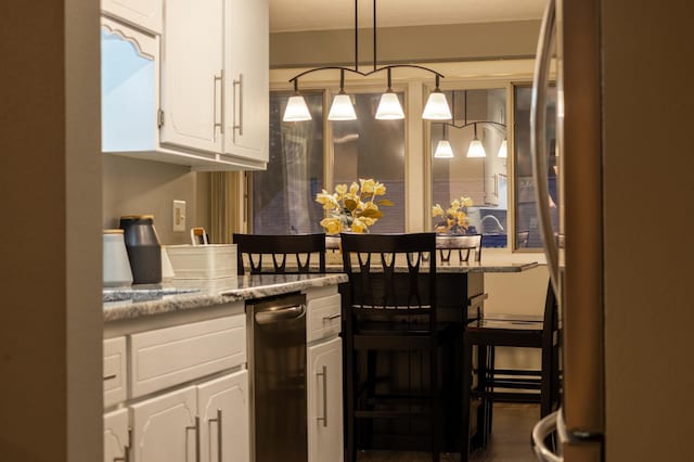 2520 Le Homme Dieu Hts NE Unit 2, Alexandria Twp, MN 56308 - kitchen with refrigerator and white cabinets