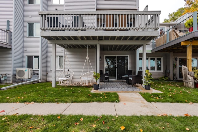 2520 Le Homme Dieu Hts NE Unit 2, Alexandria Twp, MN 56308 - view of exterior entry featuring a lawn and a patio area